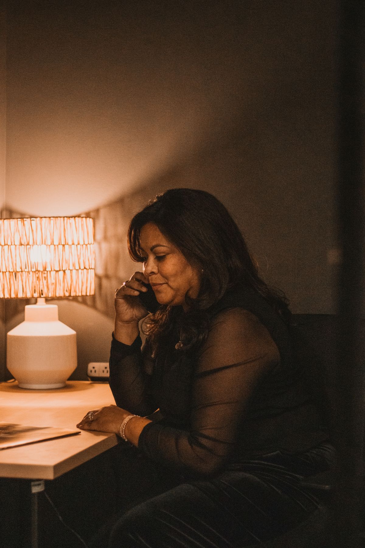 Real estate professional speaking on the phone in an office